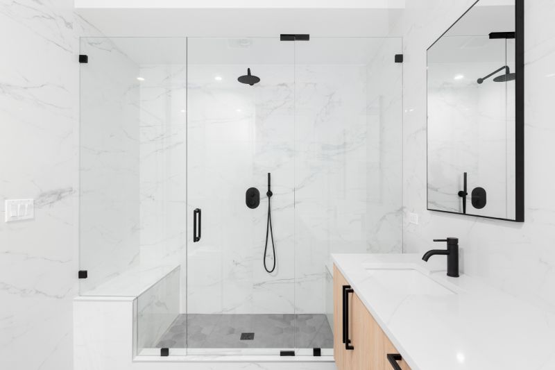 Black Matte Fixtures and Frameless Glass